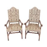 A set of eight Younger William & Mary style oak framed dining chairs, with brown patterned fabric