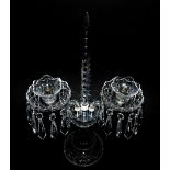 A Waterford crystal twin branch candelabrum, with a central faceted spike and faceted drops,