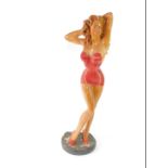 A 1950's Jantzen Girl swimsuit display figure, modelled standing in red shoes and one piece
