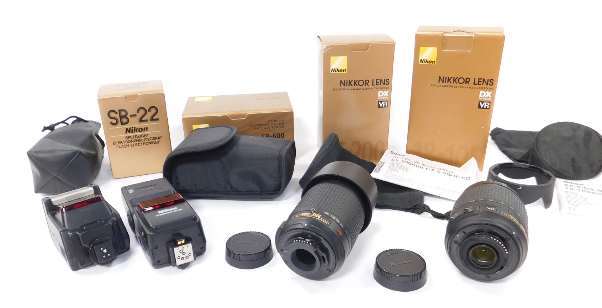 A Nikon Nikkor DX digital lens, AF-S DX - 18 - 105mm S/3.5-5.6G ED VR, a further lens, AF-S DX-
