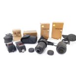 A Nikon Nikkor DX digital lens, AF-S DX - 18 - 105mm S/3.5-5.6G ED VR, a further lens, AF-S DX-