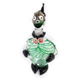 A Murano glass decanter and stopper, modelled as a clown, with green trailed decoration, modelled