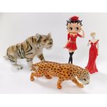 A Beswick pottery figure modelled as a cheetah, Royal Worcester porcelain figure to celebrate the