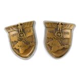 A pair of Third Reich WWII Krim Crimea shield badges, 1941/1942.