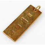 A 9ct gold ingot pendant, 29g.