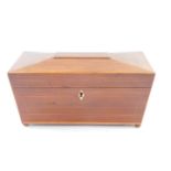 A Regency mahogany and boxwood line inlaid tea caddy, of sarcophagus form, with ivory escutcheon and