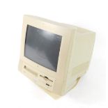 An Apple Power PC computer circa 1995, Macintosh Perfomer 5200, model number M3046, serial number