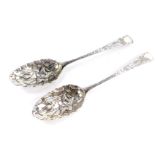 A pair of George III silver fruit spoons, embossed and engraved with birds amongst bamboo, Alice and