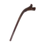 A Fijian wooden 19thC war club or kiakavo, with a gun stock head and tapering shaft of plain form,