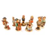 Eight Hummel figures, comprising Farm Boy, Sweet Music, School Girl, Good Friends, Brother, Globe