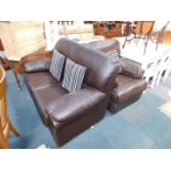 A brown leatherette two seater sofa, together with a similar brown leather manual reclining