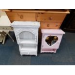 A white painted pine hanging wall shelf, with a single drawer.