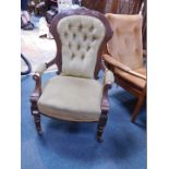 A Victorian walnut ladies armchair, with rosette and floral scratch carving, 70cm W.