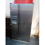 A Samsung American style fridge freezer, with water and ice dispenser, with Silver Nano Health