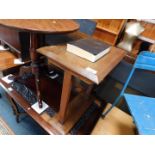 An early 20thC mahogany table, with a canted rectangular top, raised on straight square supports and