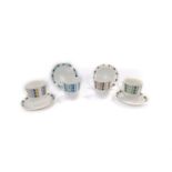 A set of four mid 20thC Royal Adderley porcelain coffee cups and saucers, decorated in the