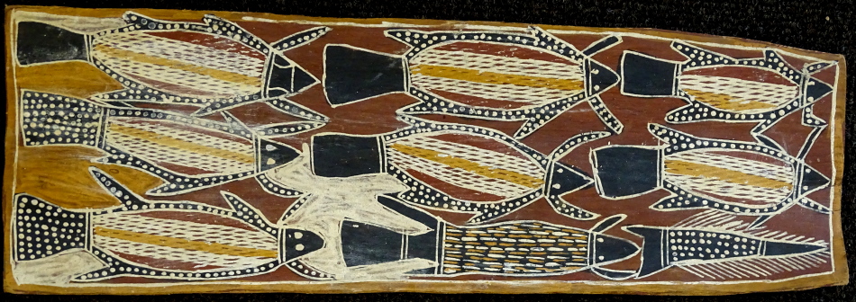 Mick Magani (1920-1984). Flying fish, aboriginal painting on wood, titled verso, 19cm x 59cm.