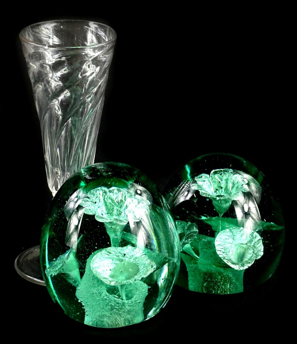 A collection of glass, to include two similar Nailsea glass dumps, each decorated with four flowers,