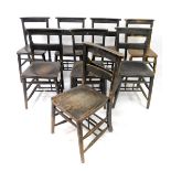 A set of six Victorian ebonised beech and elm chapel chairs.