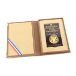 A 1984 Olympic ten dollar gold proof coin, boxed, 16.71g.