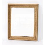 A 19thC cream painted wooden and gesso wall mirror, of rectangular form, decorated with a