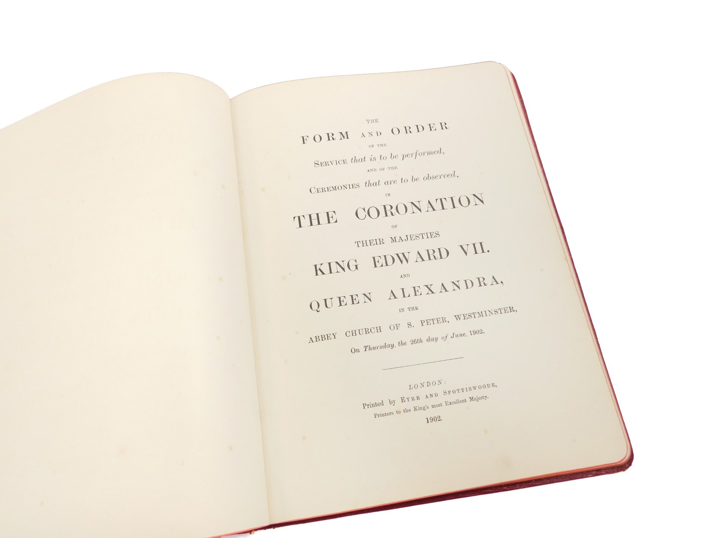 An Edward VII Coronation order of service, June 1902, gilt tooled red morocco, printed by Eyre &