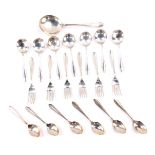 Six silver fruit spoons, Sheffield 1952., a George V serving fruit spoon, Sheffield 1939., a further