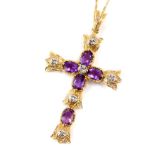 A 14ct gold amethyst and diamond cross, on a chain with bolt ring clasp, 8.2g.