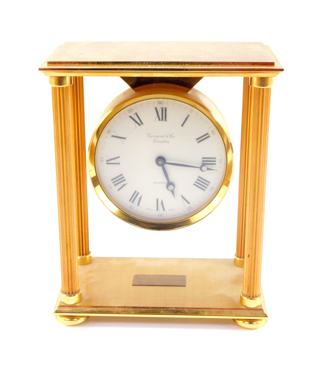 A Garrard and Company late 20thC gold plated brass mantel clock, of portico form, with fluted