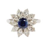 A sapphire and diamond daisy head ring, set in 18ct white gold and platinum, sapphire approx 1ct,