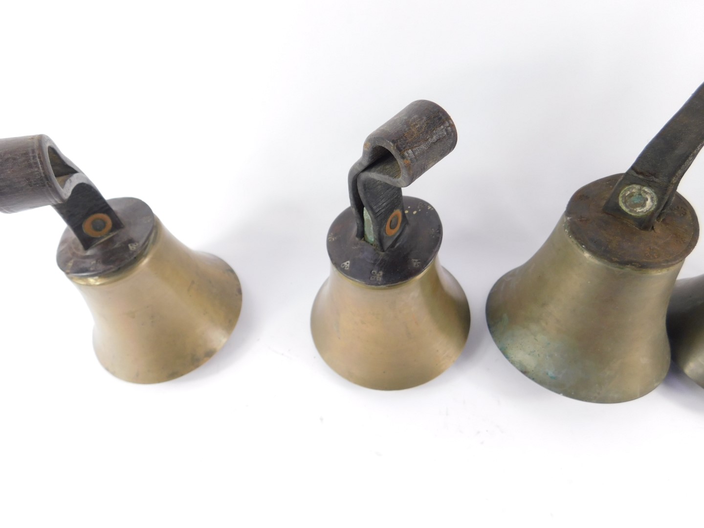 Six hand bells with hammers, one lacking, tooled leather handles. - Image 2 of 5