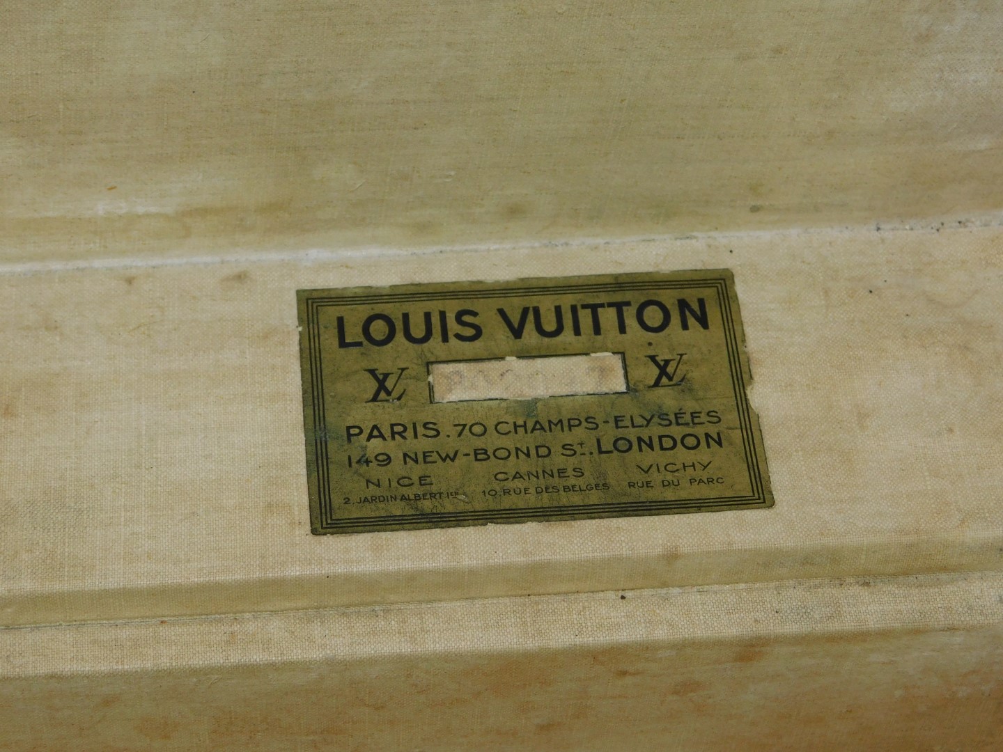 A Louis Vuitton cabin trunk, early 20thC with monogrammed brown canvas, monogrammed tan edge and - Image 7 of 8