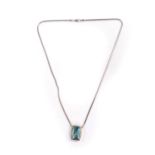 An 18ct white gold aquamarine and diamond pendant, of oblong form, open backed, on a chain, on