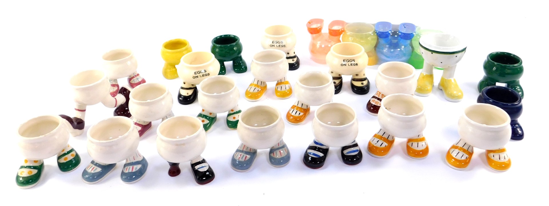 Fifteen Carltonware lustre pottery 'Walking' egg cups, including a peg leg cup, and others.