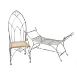 A wrought iron Roman style window seat, of curved form with scrolling arms, 124cm W, together with a