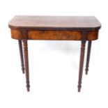 A George IV mahogany foldover tea table, raised on turned legs, 75cm H, 82cm W, 46cm D.
