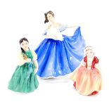 Three Royal Doulton figures comprising Elaine (HN2791), 19cm H, Dinky Do (HN2120), 11.5cm H, and