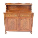 A George IV flame mahogany chiffonier, the back with a galleried small shelf, raised on s scroll