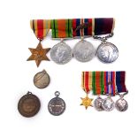 A WWII and pre war group of medals, awarded to Wing Commodore A T Atkins, comprising Africa Star,