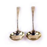 A pair of George III silver cream ladles, initial engraved, Stephen Adams II, London 1808, 3.24oz.