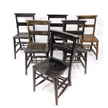 A set of six Victorian ebonised beech and elm chapel chairs.