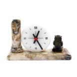 A mid 20thC marble mantel clock, circular white dial bearing Arabic numerals at quarters, quartz