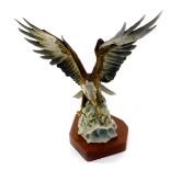 A Kaiser porcelain figure modelled as a bald eagle, limited edition 268/800, No 497, printed and