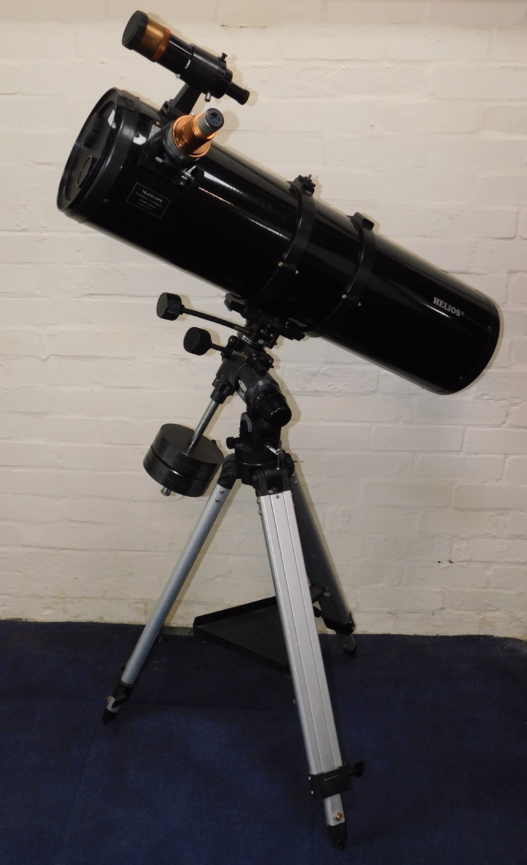 A Helios Sky Scan 2001 reflector telescope, on a tripod base, 91cm L.