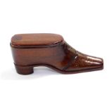 A 19thC rosewood snuff box modelled as a shoe, with brass pin decoration, 10cm L.