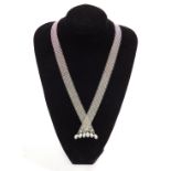 An 18ct white gold chain mail necklace, with grey baroque pearl drops, and set with small