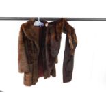 A mink jacket, together with a mink stole.