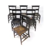 A set of eight Victorian ebonised beech and elm chapel chairs.