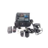 A Minolta 9000AF camera, Program 4000AF flash, zoom lens, carry case and accessories.