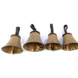 Four hand bells, D E F# and G, with hammers, tooled leather handles.